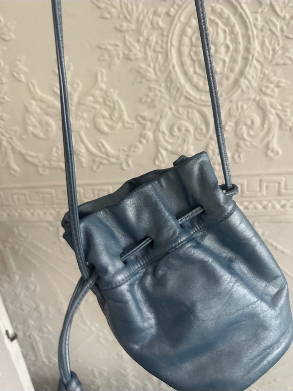 Vintage blue leather drawstring mini crossbody bag